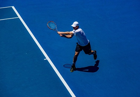 A guy playing tennis