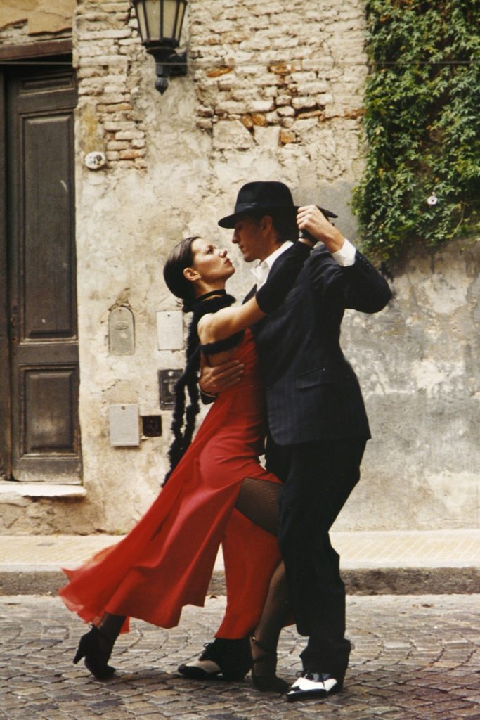 Partner dances: a couple dancing Tango