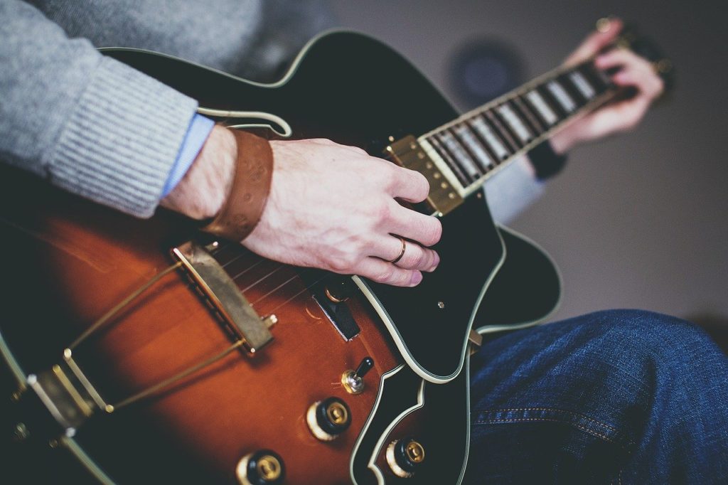 A guy playing guitar