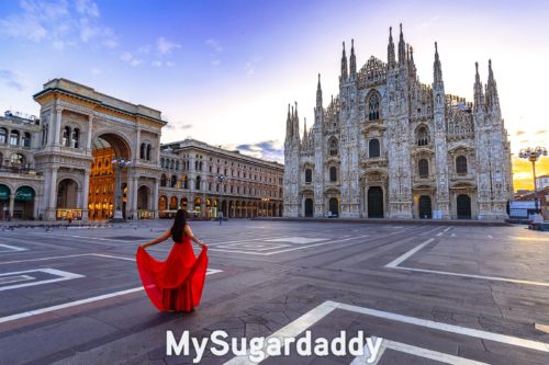 woman standing in square at one of the biggest fashion capitals in the world, Milan