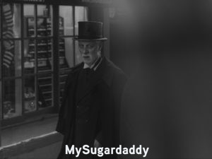 old man wearing a top hat on street, obviously not the first sugar daddy