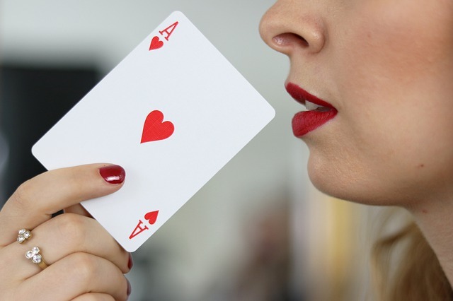 woman playing one of the most popular erotic games strip poker