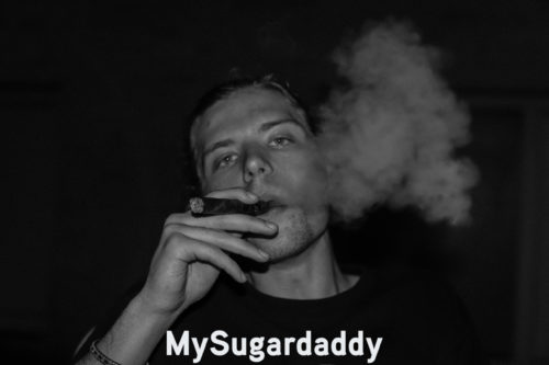 lonely sugar daddy smoking a cigar