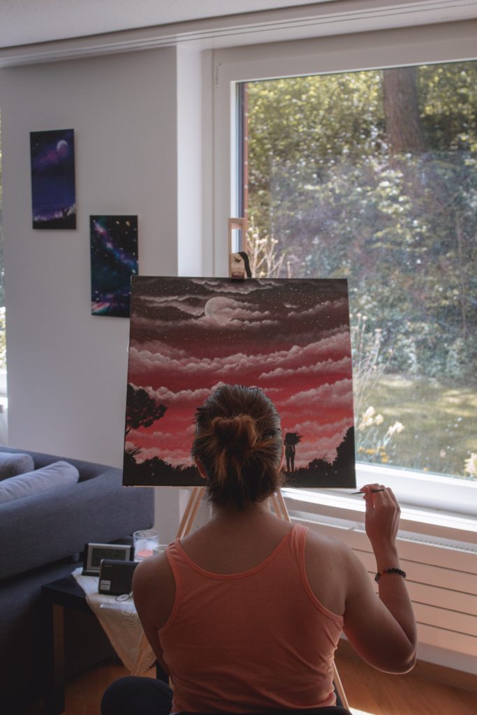 girl painting in flow state