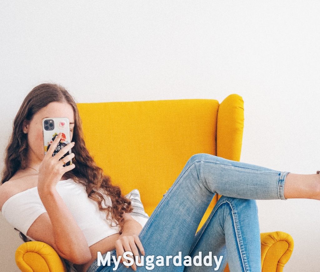 mirror selfies of woman on yellow armchair