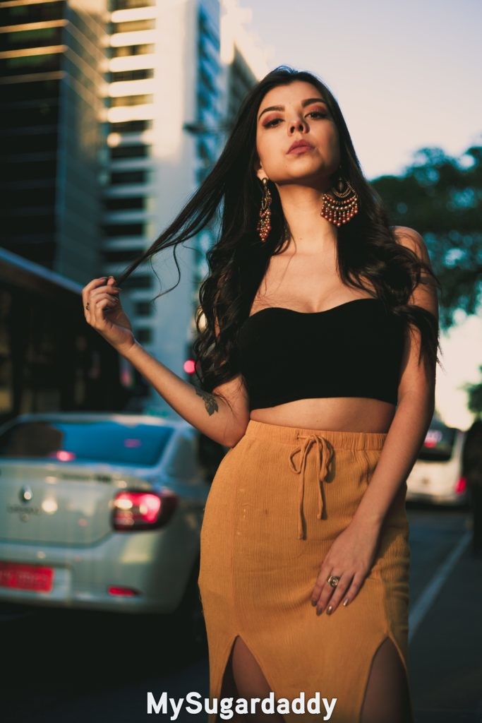 single mom posing for picture near busy street